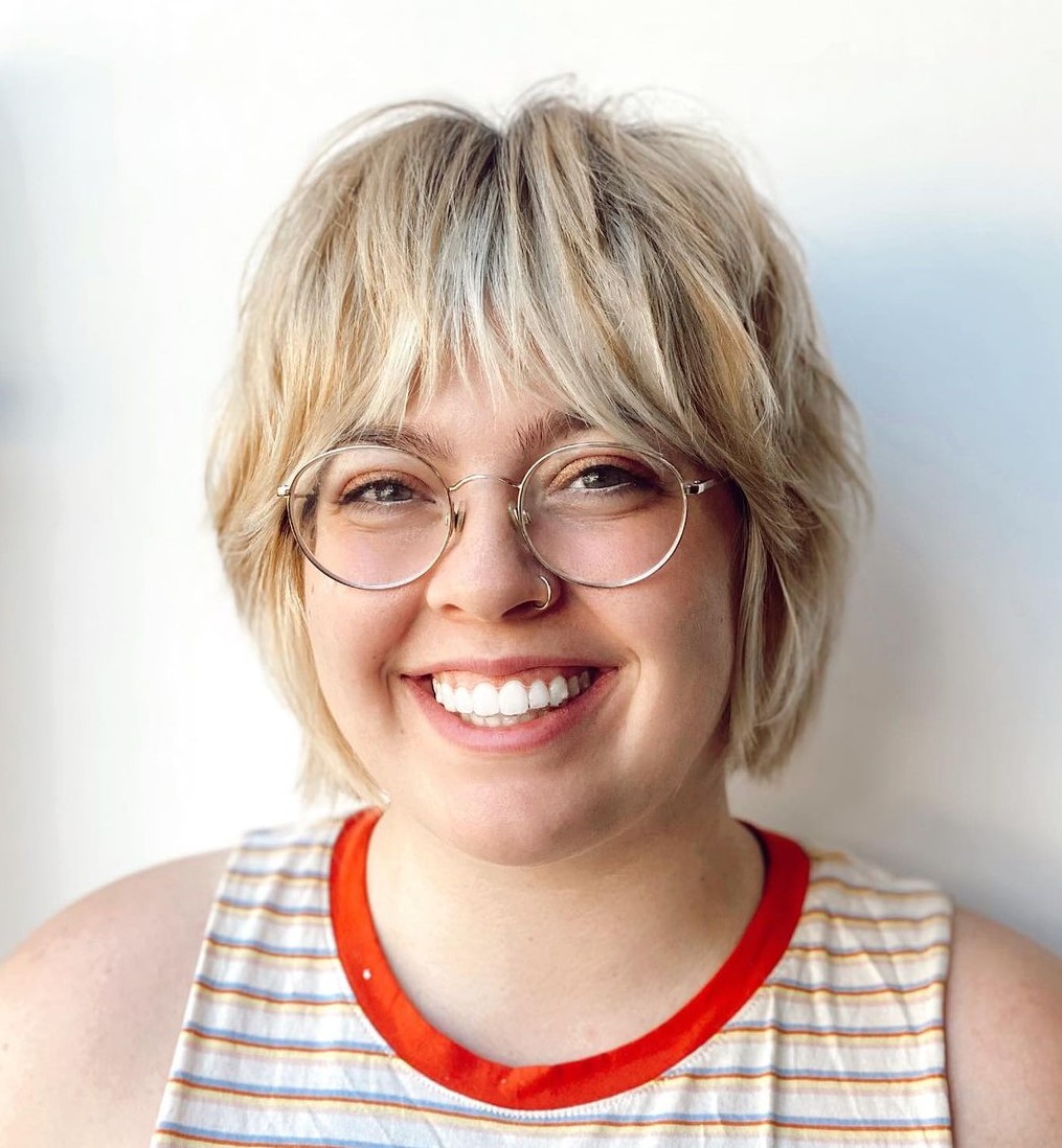 Fun Layered Bob with Bangs and Glasses