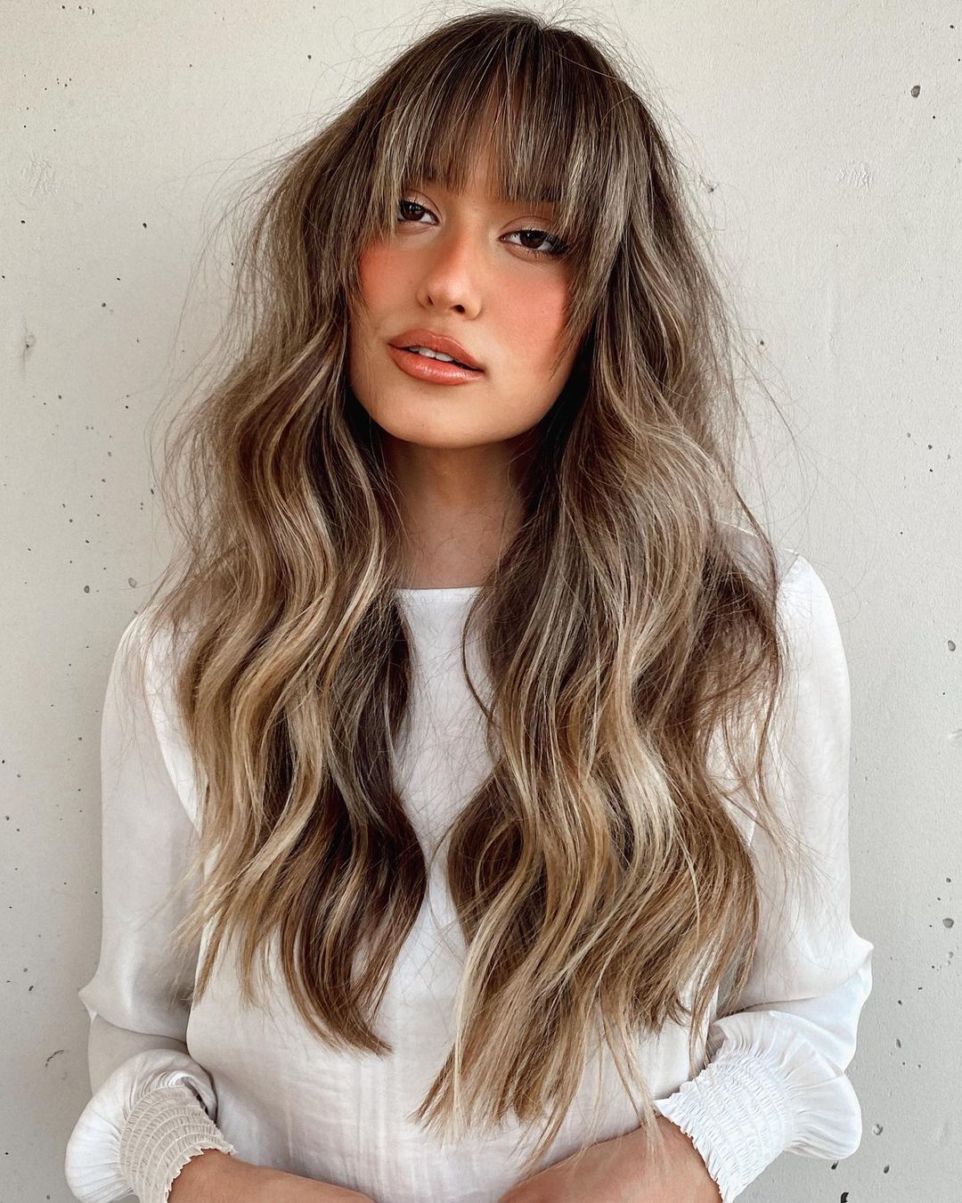 Long Wavy Hairstyle with Choppy Bangs